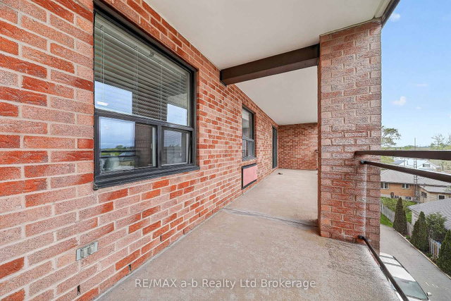 402 - 75 Bridge Street E