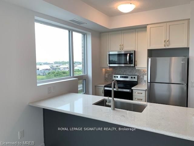 406 - 5055 Greenlane Road