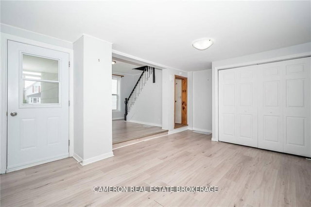 8-8 1/2 Adam Dixon Avenue