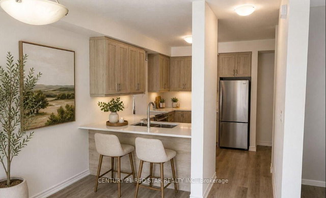 102 - 461 Blackburn Drive