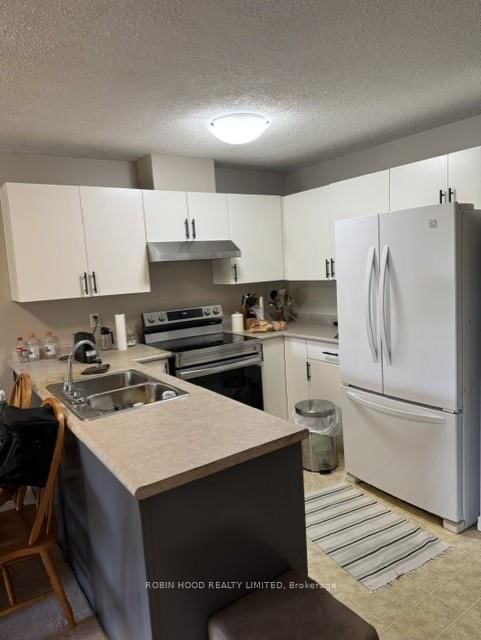 203 - 3160 Wildwood Drive