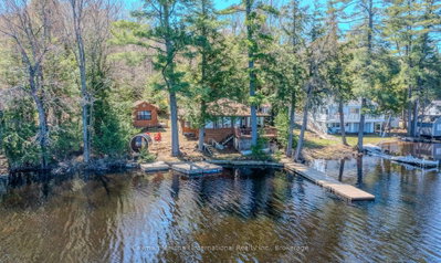 Detached House for sale at 1065 Rainbow Lane, Bracebridge, Ontario, P1L 1X3 - Draper - MLS: X13145088