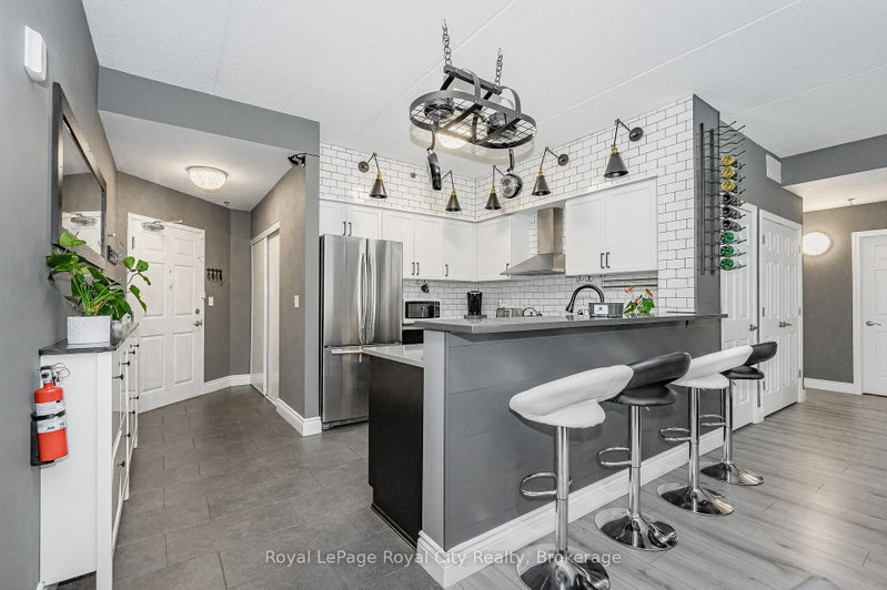 102 - 308 Watson Parkway N