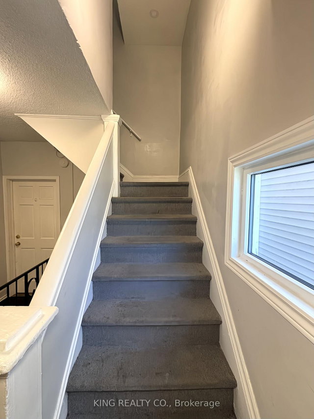 Upper - 27 Berryman Avenue E