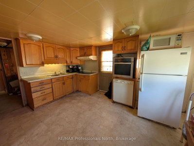 61 RIVERSIDE Avenue • South River, ON photo 7