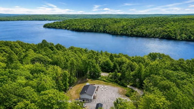Detached House for sale at 1052 Limberlost Point Road, Parry Sound Remote Area, Ontario, P0H 2R0 - Restoule - MLS: X13646196
