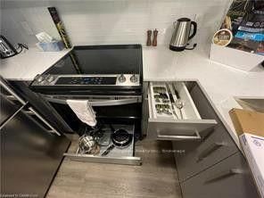 Condo leased at 813-15 QUEEN Street, Hamilton, Ontario, L8P 0C6 - Central - MLS: X13688064