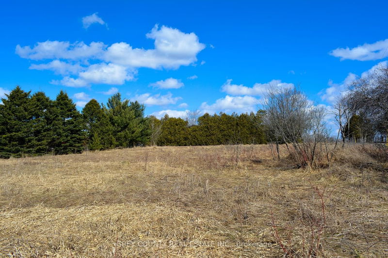 home for sale on 305765 180 Sideroad