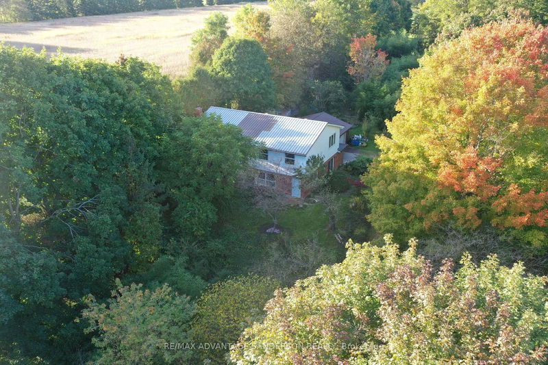 home for sale on 14482 Eight Mile Road
