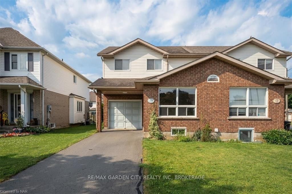 Semi-Detached House sold at 128 DEVINE Crescent, Thorold, 558 - Confederation Heights, L2V 5A4 - MLS: X9407404