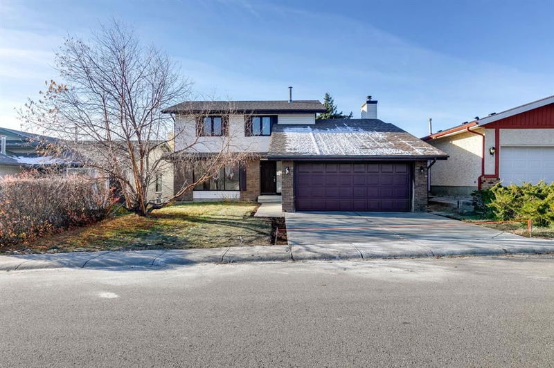 7 Woodmont Way SW, Calgary, Alberta (MLS A2175635)