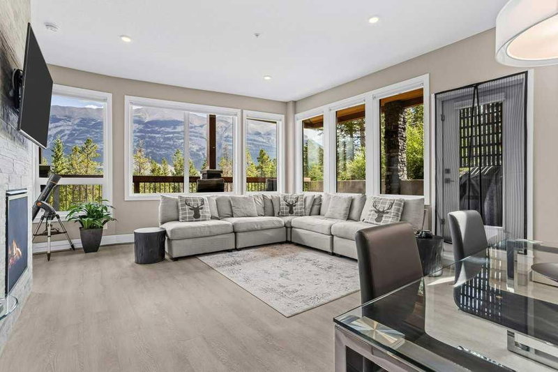 115 - 106 Stewart Creek Rise, Canmore, T1W 0N3 | Image 2