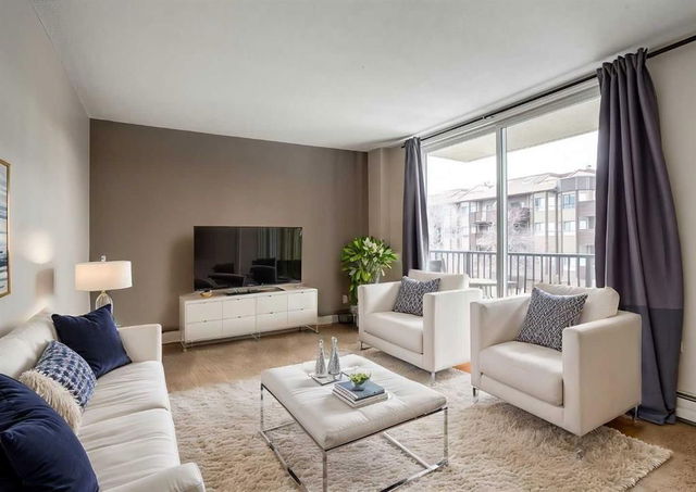 302 - 635 57 Avenue