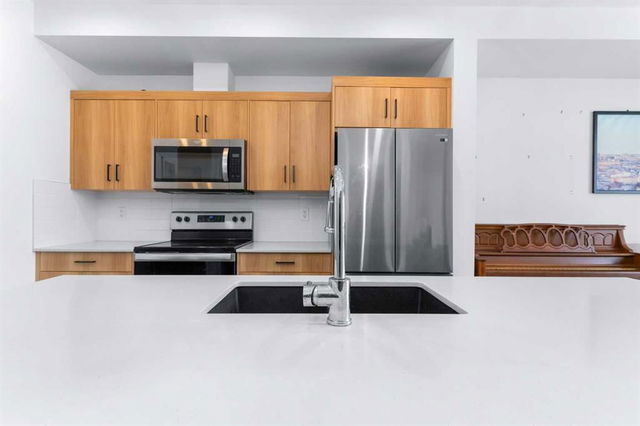 208 - 20 Sage Hill Walk