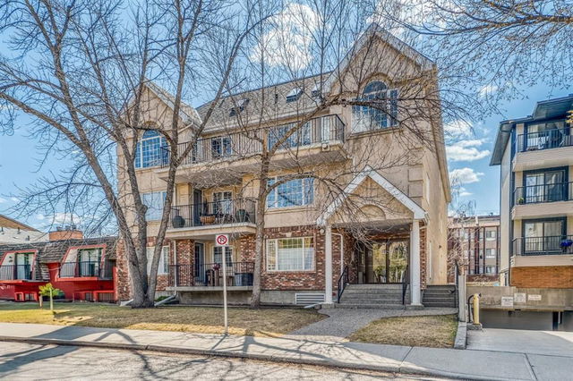 203 - 705 56 Avenue