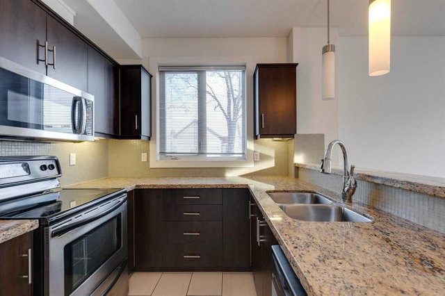 101 - 320 12 Avenue NE