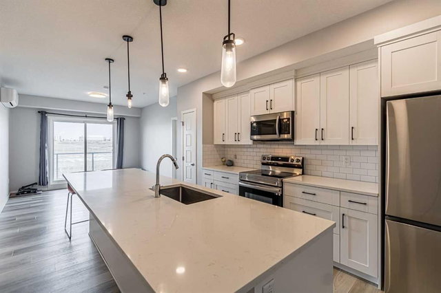 203 - 360 Harvest Hills Way NE