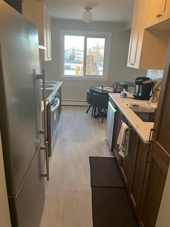 302 - 10014 Morrison Street