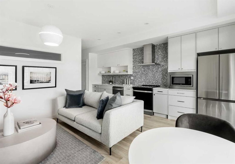 302 - 60 Water Cove SE