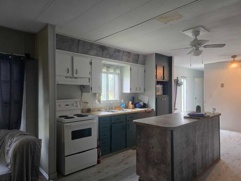 304 - 72133 Range Road 11