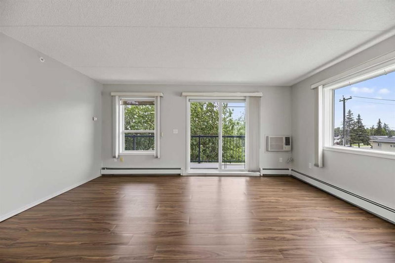 210 - 4514 54 Avenue
