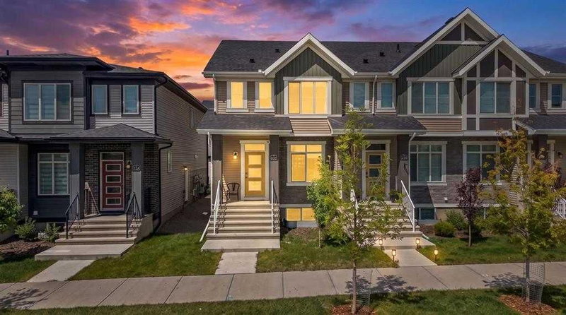 Row/Townhouse at 242 Carrington Gate NW, Carrington — listing photo