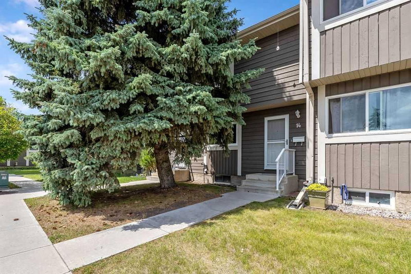 Row/Townhouse at 14, 14736 Deerfield Drive SE, Deer Run — listing photo