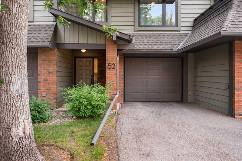 Row/Townhouse at 52, 10030 Oakmoor Way SW, Oakridge — listing photo