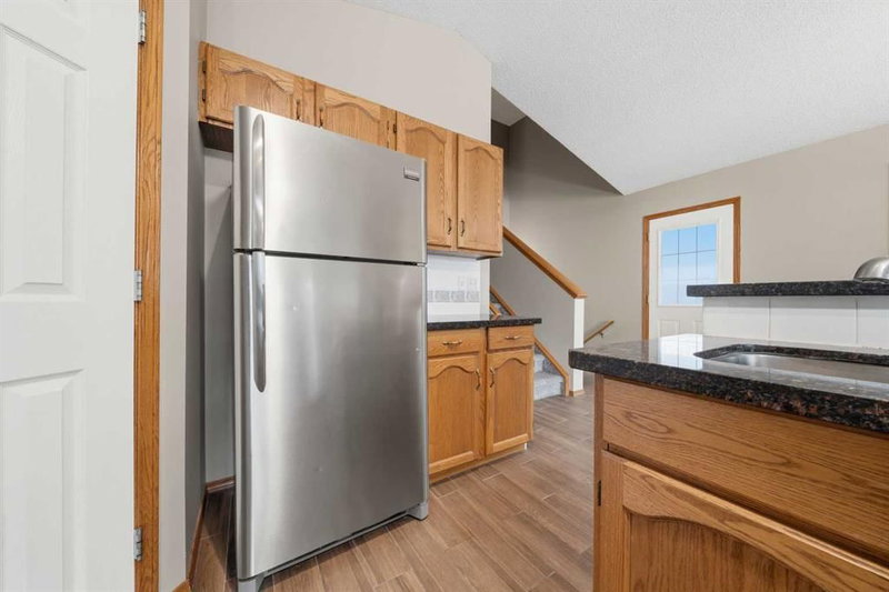 142 Arbour Meadows Close NW, Arbour Lake — interior photo