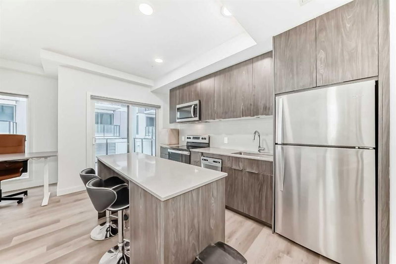 204, 455 1 Avenue NE, Crescent Heights — interior photo 5
