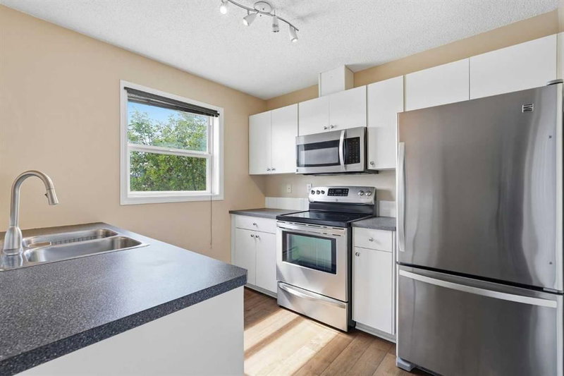 221, 290 Shawville Way SE, Shawnessy — interior photo