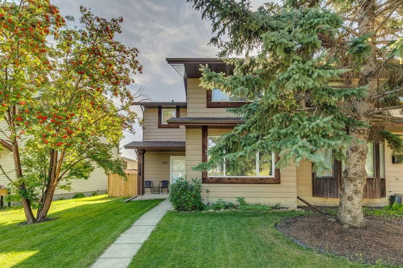 Semi Detached (Half Duplex) at 558 Strathcona Drive SW, Strathcona Park — listing photo