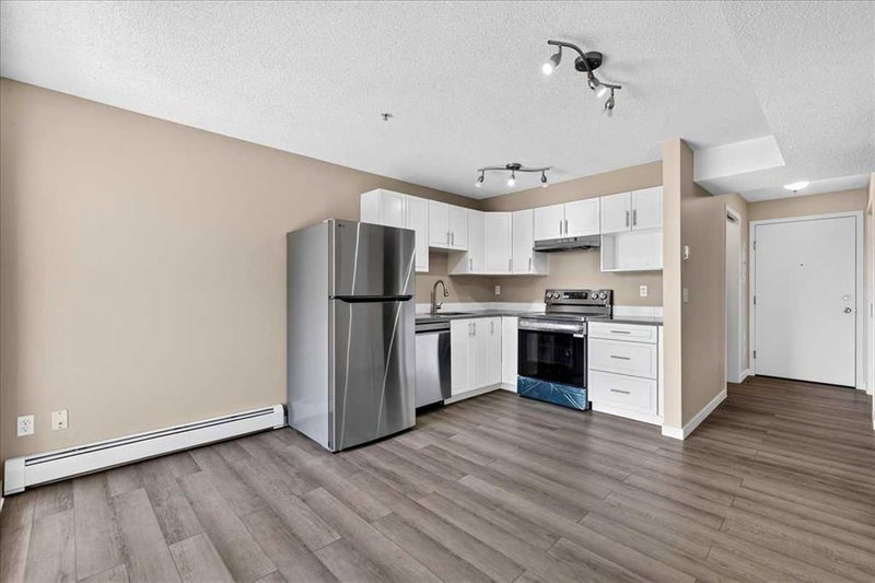 212, 1717 60 Street SE, Red Carpet — interior photo 7