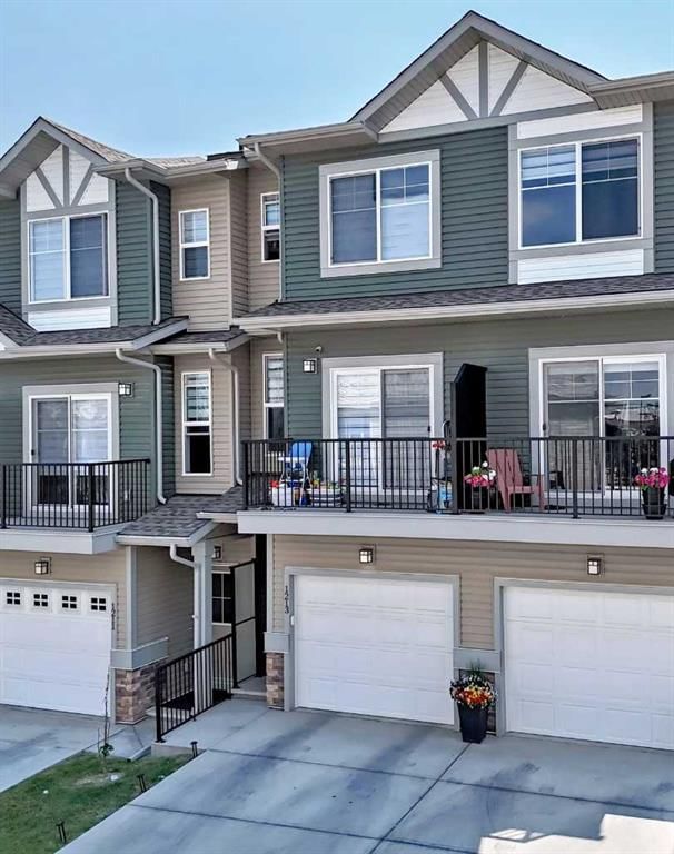 Row/Townhouse at 1213 Sage Hill Grove NW, Sage Hill — listing photo