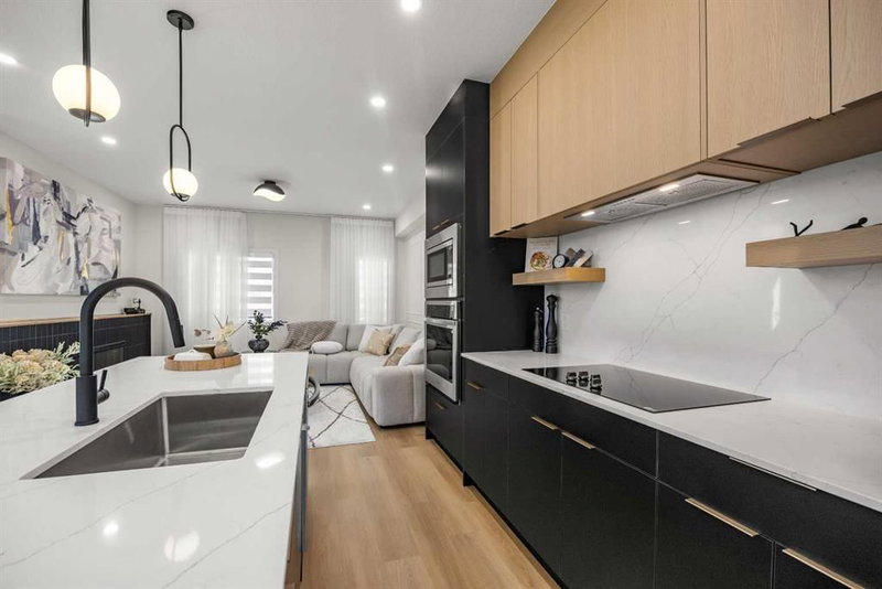 305 - 67 Panatella Square NW