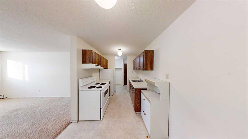 301 - 9656 Hillcrest Drive