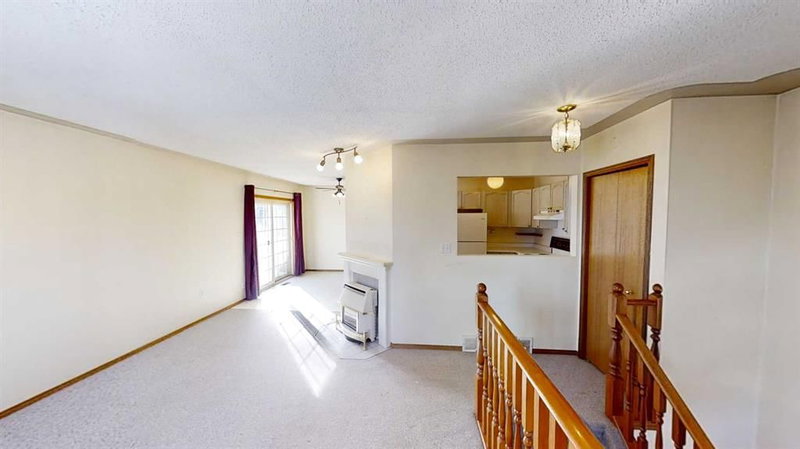 B - 9406 100 Avenue