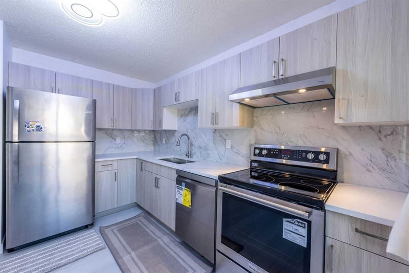 34 - 3029 Rundleson Road NE
