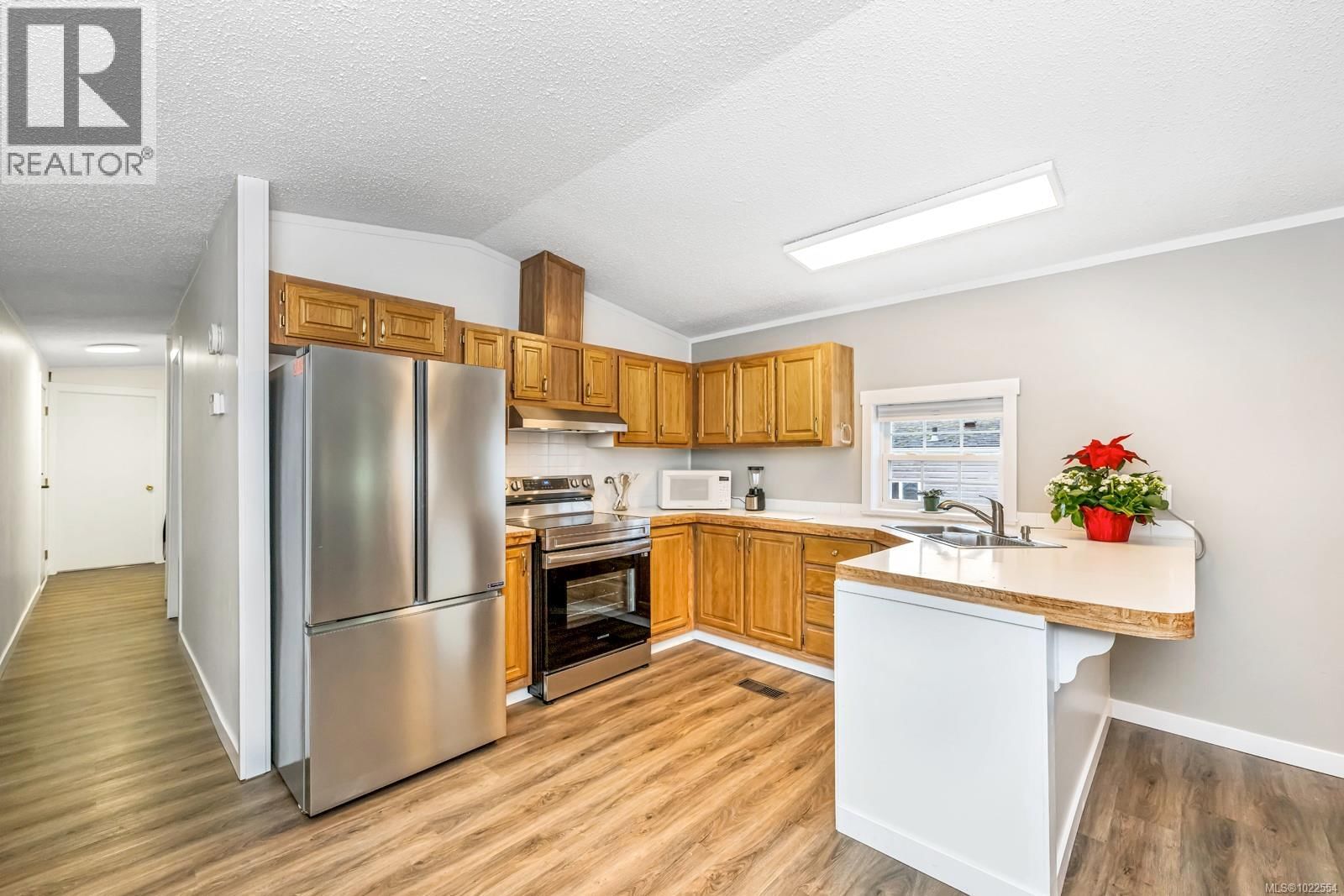 32 - 7021 GRANT ROAD Image 2