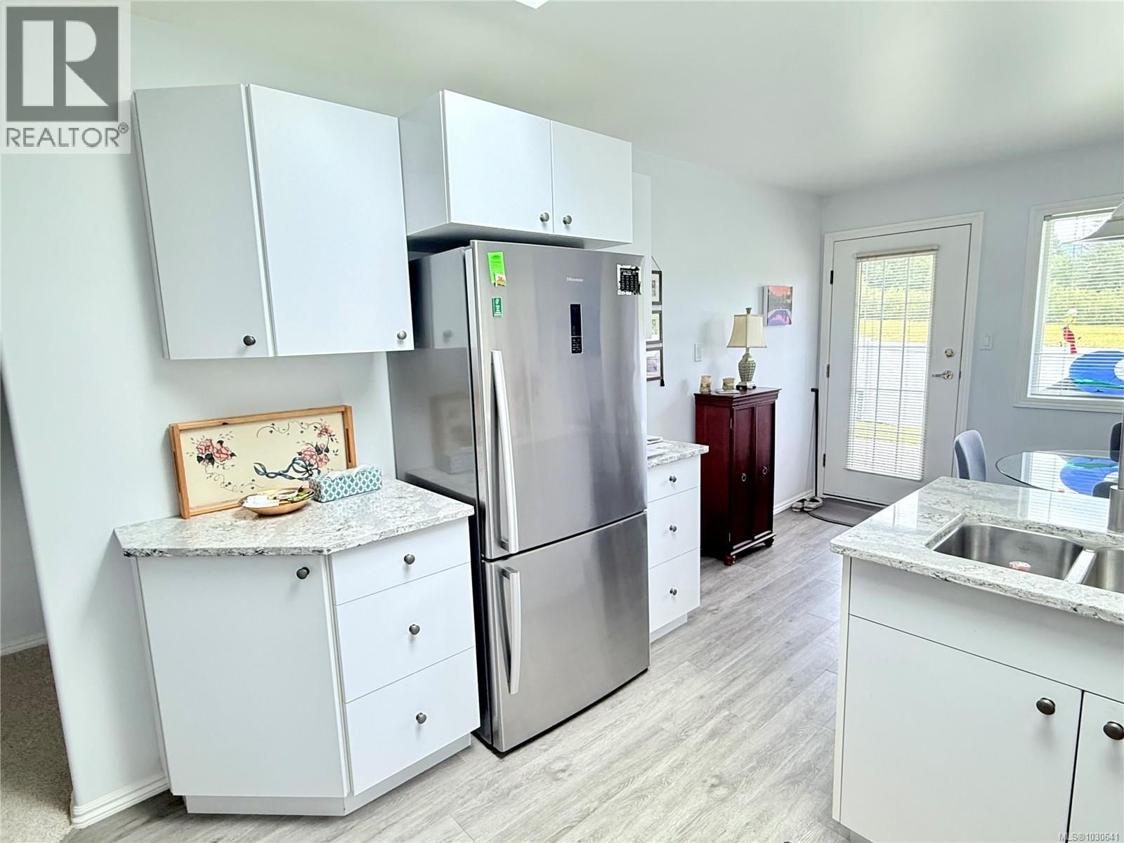 4 - 6111 SAYWARD ROAD Image 3