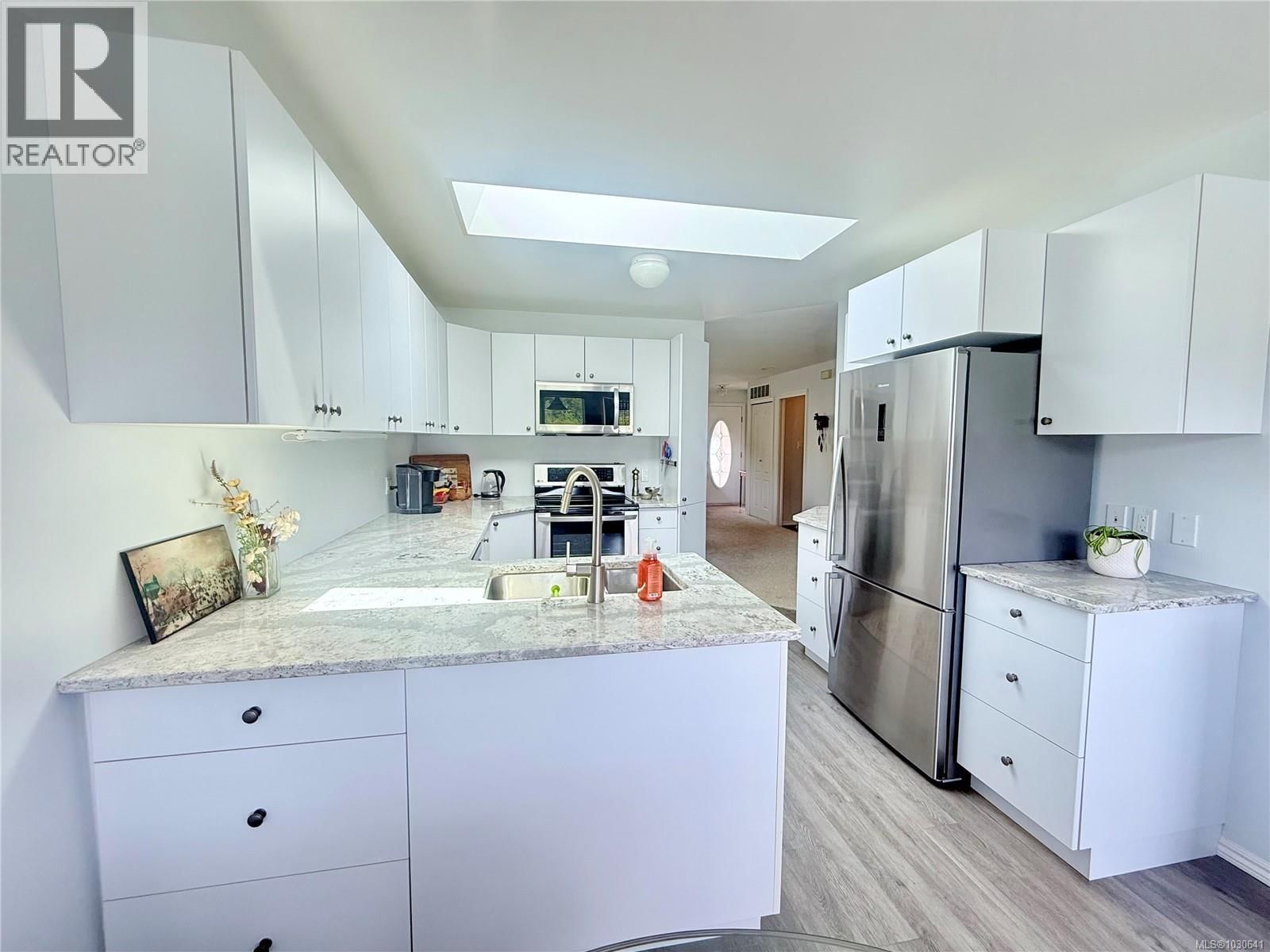 4 - 6111 SAYWARD ROAD Image 6