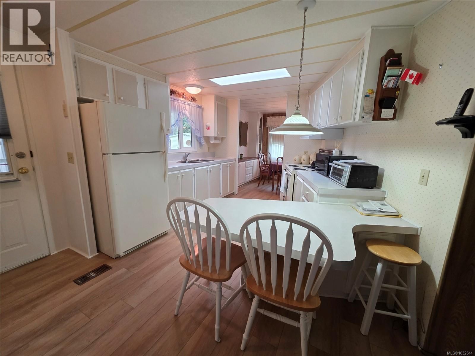 13 - 4935 BROUGHTON STREET Image 2