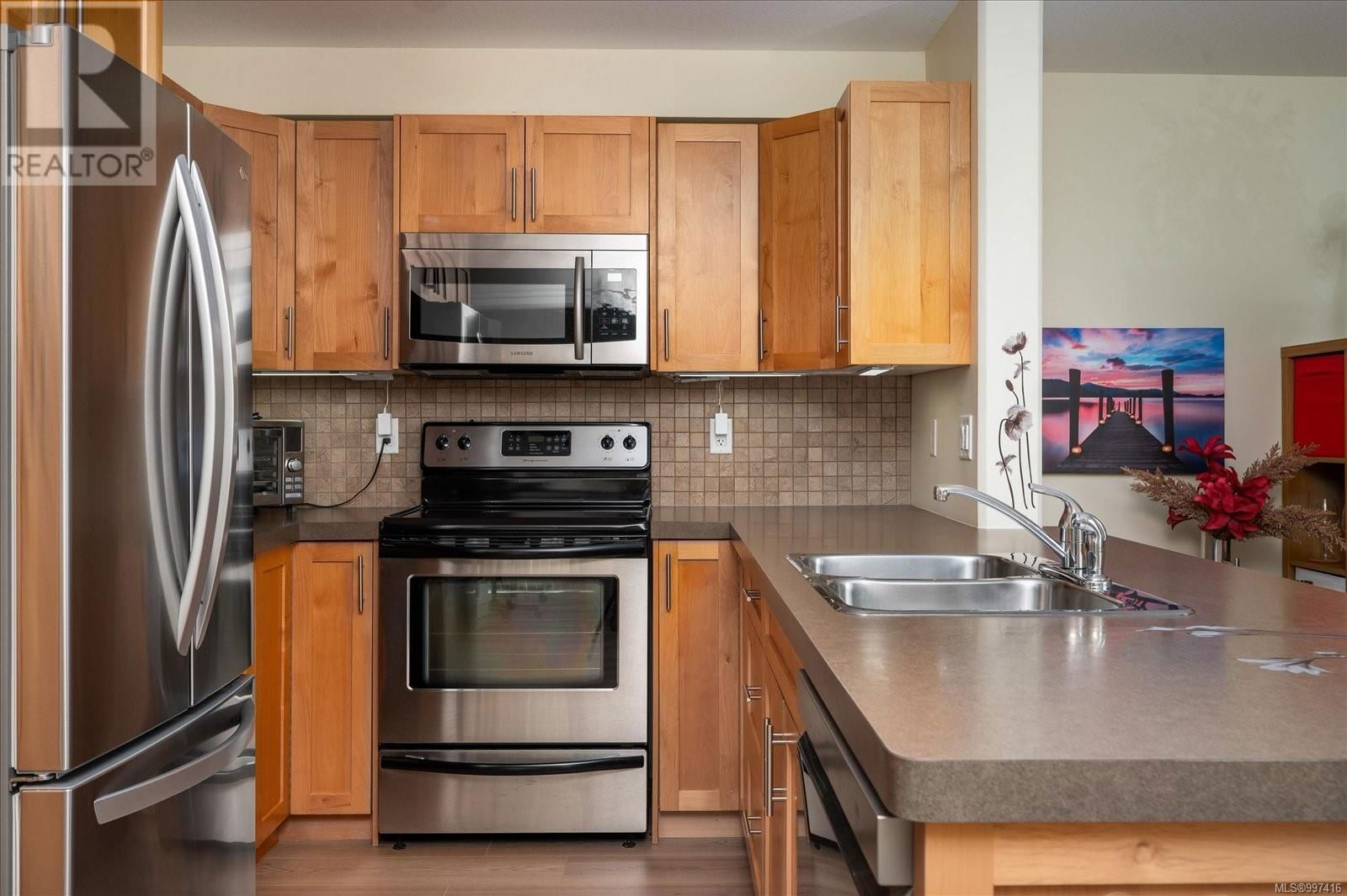 101 - 5955 KADEN PLACE Image 14
