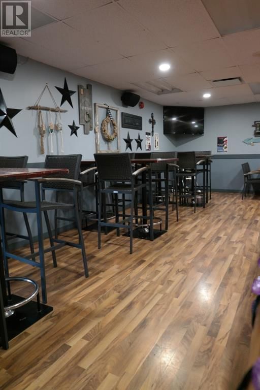 Image #1 of Restaurant for Sale at 8 186007 Priddis Valley Road W, Priddis, Alberta