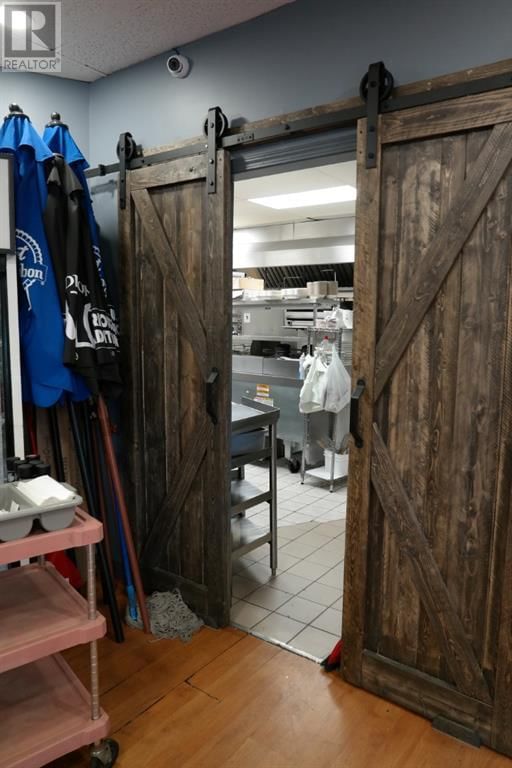 Image #1 of Restaurant for Sale at 8 186007 Priddis Valley Road W, Priddis, Alberta