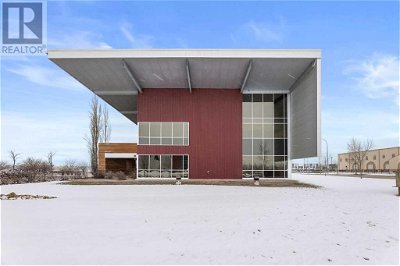 Image #1 of Commercial for Sale at 101 261211 Wagon Wheel Way, Balzac, Alberta