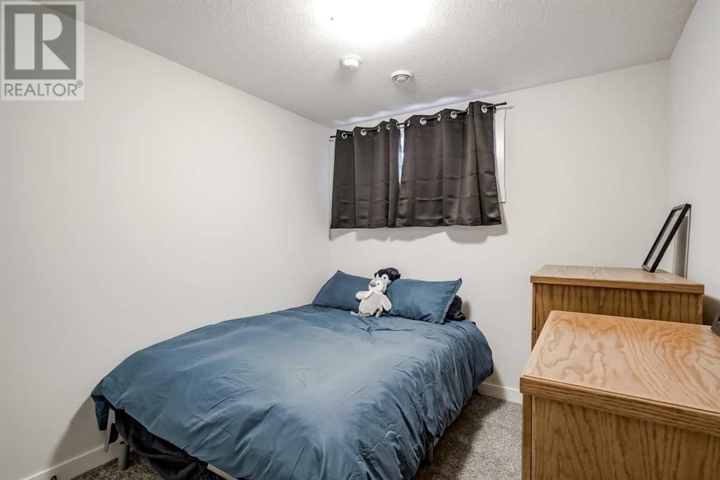 225 SAGE BLUFF RISE NORTHWEST Image 35