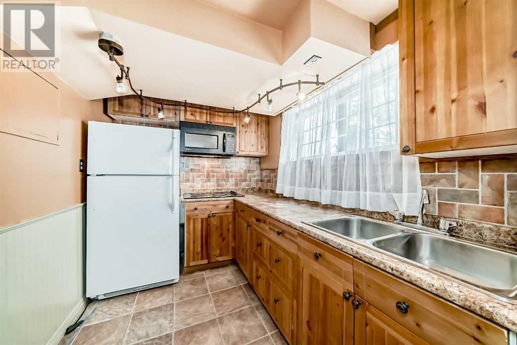 6915 RANCHVIEW DRIVE NORTHWEST Image 32