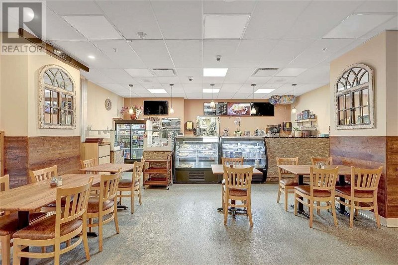 Image #1 of Restaurant for Sale at 102 1196 Pinetree Way, Coquitlam, British Columbia