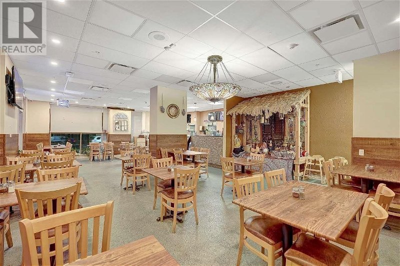 Image #1 of Restaurant for Sale at 102 1196 Pinetree Way, Coquitlam, British Columbia